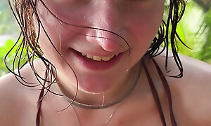 Frying teen adjacent to bikini gives oily titjob and suck my dick on public beach